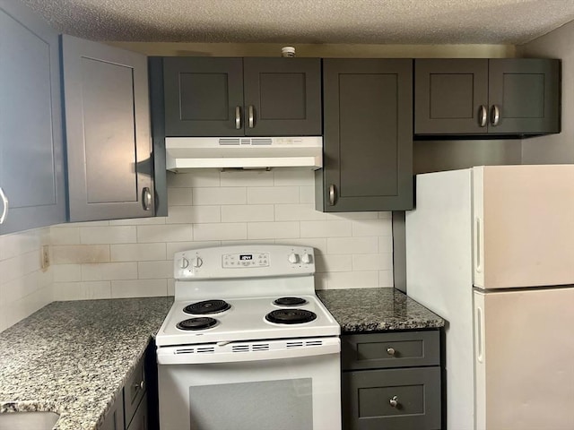 10 Longworth Ave Unit 12, Brockton, MA 02301 - kitchen with white appliances, under cabinet range hood, decorative backsplash, dark stone counters, and a textured ceiling