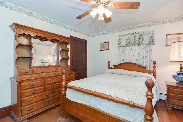 886 Canterbury St, Boston, MA 02131 - bedroom featuring wood finished floors, baseboard heating, and ceiling fan