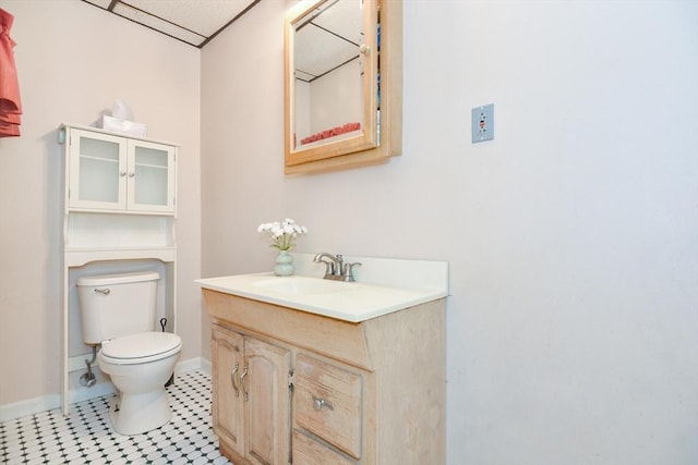 886 Canterbury St, Boston, MA 02131 - half bathroom featuring toilet, vanity, and baseboards