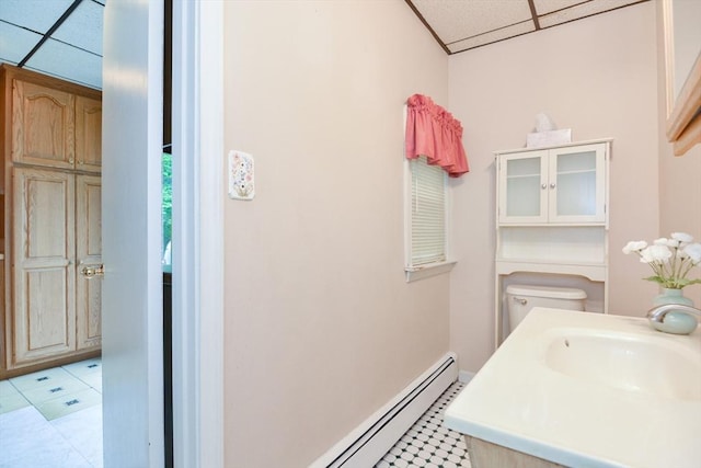 886 Canterbury St, Boston, MA 02131 - bathroom featuring toilet, tile patterned flooring, vanity, baseboards, and a drop ceiling