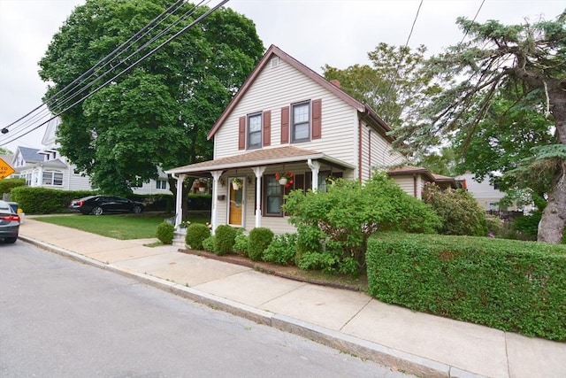 886 Canterbury St, Boston, MA 02131 - view of front of property with a porch
