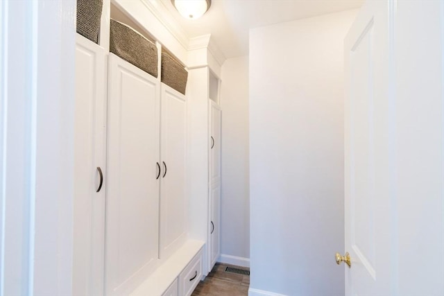 mudroom with visible vents and baseboards