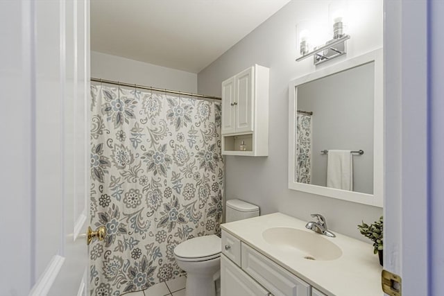 full bath featuring tile patterned floors, toilet, and vanity