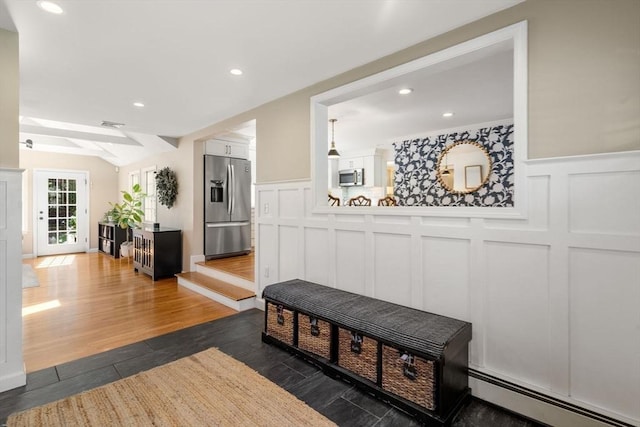 mudroom with a baseboard heating unit, wainscoting, recessed lighting, and a decorative wall