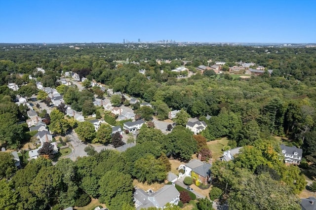 aerial view with a residential view and a wooded view