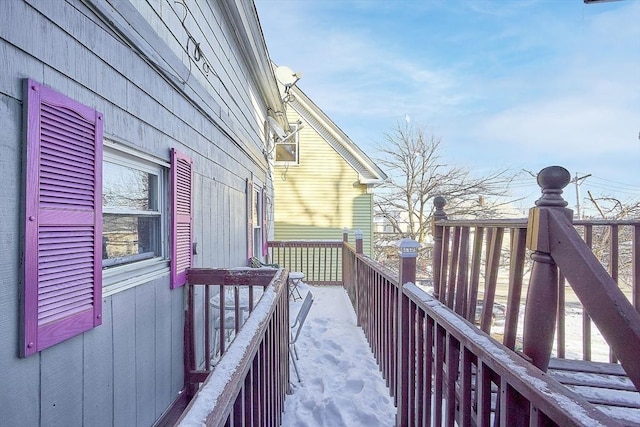 view of home's exterior featuring a wooden deck