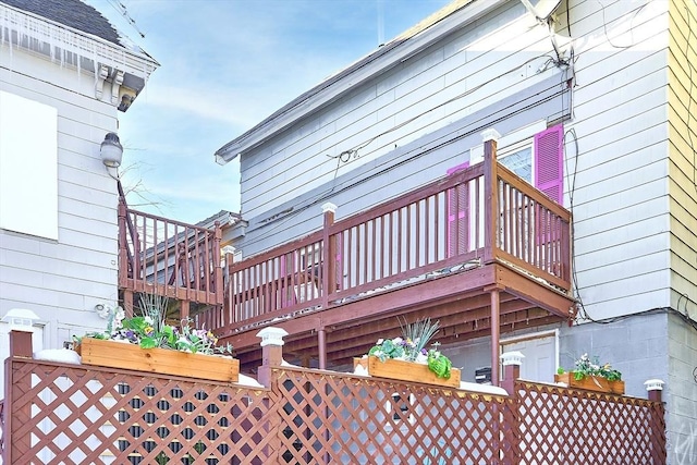 rear view of house featuring a balcony