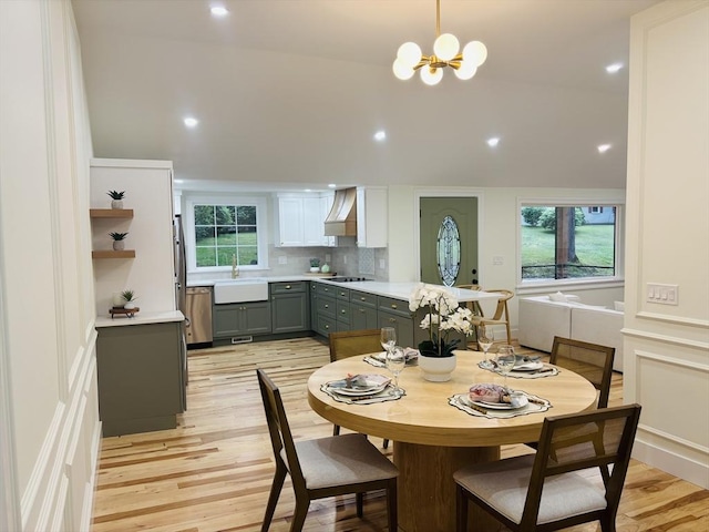 16 Chestnut St, Westborough, MA 01581 - dining space with light wood-style flooring, recessed lighting, a chandelier, and vaulted ceiling