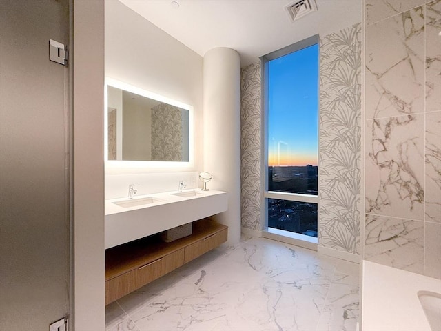 188 Brookline Ave Unit Ph28C, Boston, MA 02215 - bathroom with double vanity and marble finish floors