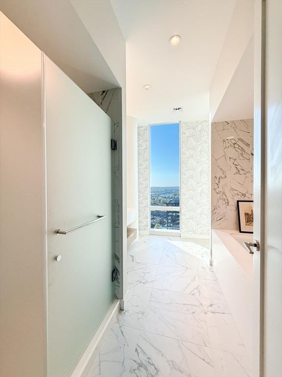 188 Brookline Ave Unit Ph28C, Boston, MA 02215 - full bath featuring a tub, marble finish flooring, and recessed lighting