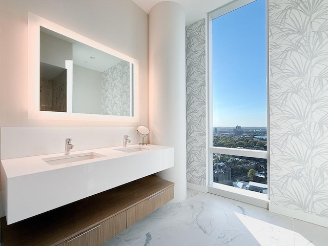 188 Brookline Ave Unit Ph28C, Boston, MA 02215 - bathroom featuring marble look tiles and double vanity