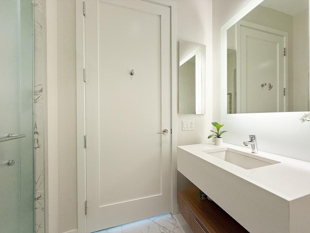 188 Brookline Ave Unit Ph28C, Boston, MA 02215 - bathroom featuring marble finish floors, vanity, and a shower with shower door