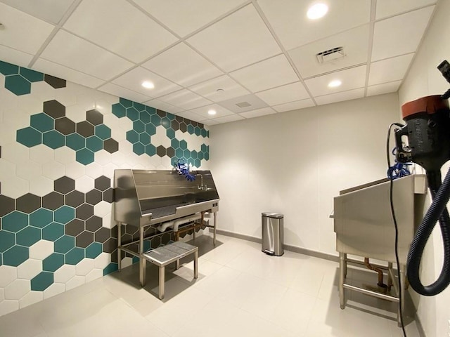 188 Brookline Ave Unit Ph28C, Boston, MA 02215 - miscellaneous room featuring pet washing station, recessed lighting, a drop ceiling, and baseboards