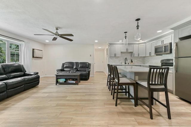 56 Coffey Unit 7, Boston, MA 02122 - living area with light wood-style flooring, a ceiling fan, and recessed lighting