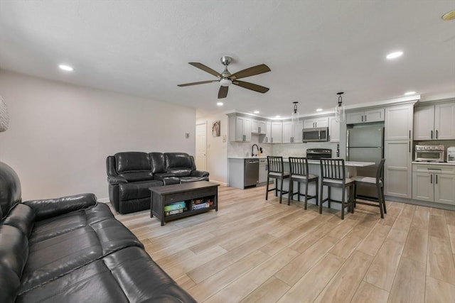 56 Coffey Unit 7, Boston, MA 02122 - living area featuring ceiling fan, recessed lighting, and light wood-type flooring