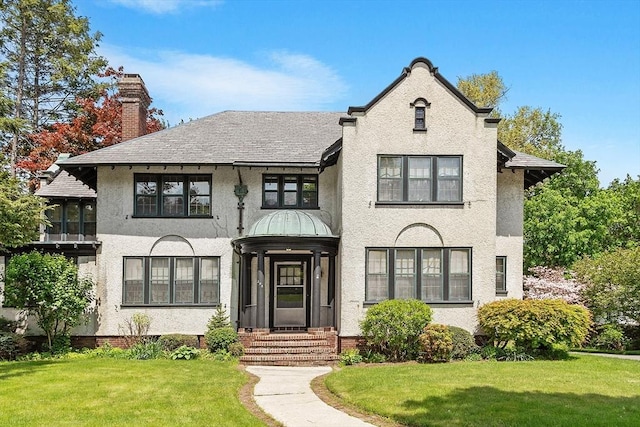 298 Highland St, Worcester, MA 01602 - french country inspired facade featuring a front yard, stucco siding, and a chimney