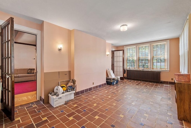 298 Highland St, Worcester, MA 01602 - empty room featuring radiator and baseboards