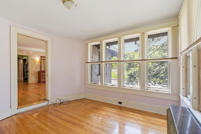 298 Highland St, Worcester, MA 01602 - spare room featuring baseboards and light wood-style floors