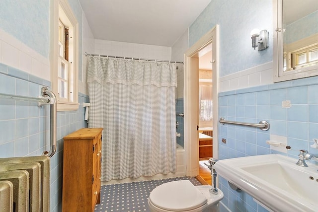 298 Highland St, Worcester, MA 01602 - full bath featuring tile walls, radiator heating unit, shower / tub combo, and toilet