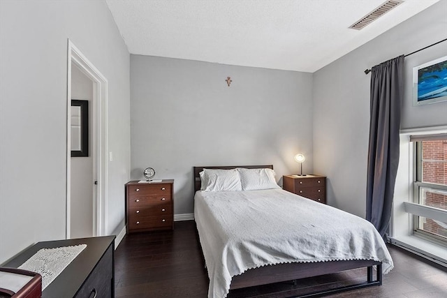 54 Forest St Unit 411, Medford, MA 02155 - bedroom featuring dark wood-style flooring