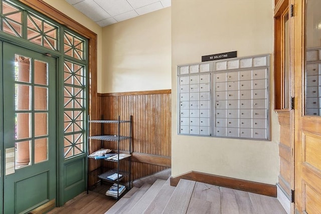 54 Forest St Unit 411, Medford, MA 02155 - view of property's community with mail area and a wainscoted wall