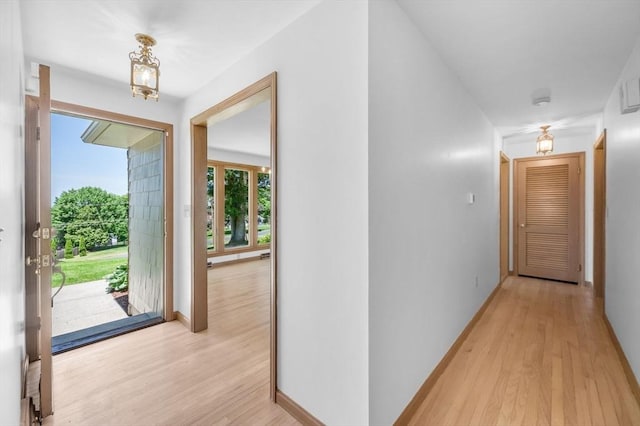 24 Skyridge Dr, Somers, CT 06071 - corridor featuring light wood-type flooring and baseboards