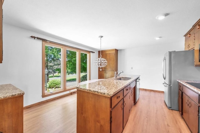 24 Skyridge Dr, Somers, CT 06071 - kitchen with a sink, light wood-style floors, and baseboards