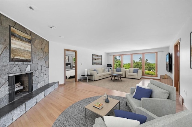 24 Skyridge Dr, Somers, CT 06071 - living room featuring a fireplace and wood finished floors