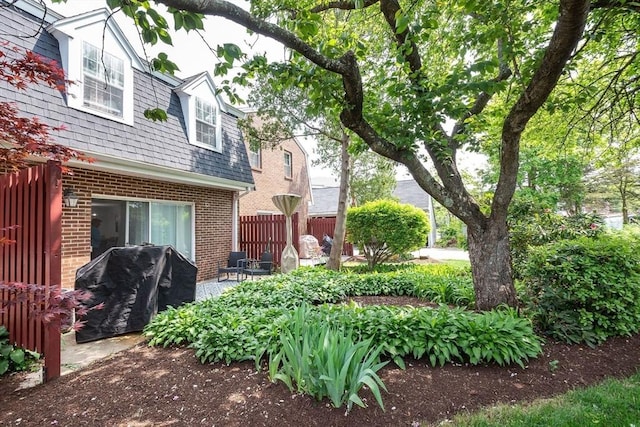 view of yard with a patio area and fence