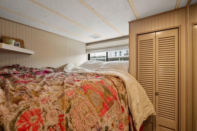 1 13th St Dock B, Unit Dock B, Boston, MA 02129 - bedroom featuring a textured ceiling and a closet