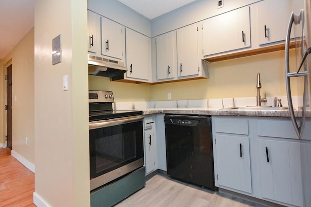 1186 Worcester Rd Unit 1221, Framingham, MA 01702 - kitchen with dishwasher, stainless steel range with electric stovetop, light wood-style flooring, and under cabinet range hood