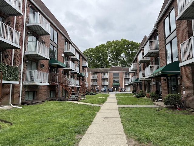 1186 Worcester Rd Unit 1221, Framingham, MA 01702 - view of community featuring a yard