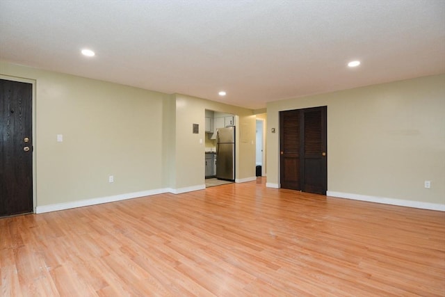 1186 Worcester Rd Unit 1221, Framingham, MA 01702 - empty room with light wood finished floors, recessed lighting, and baseboards
