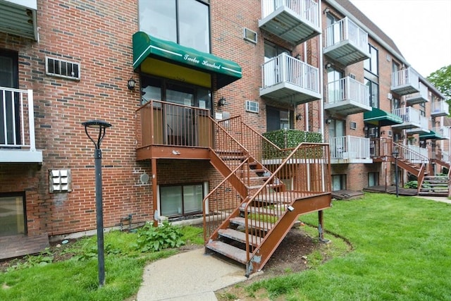 1186 Worcester Rd Unit 1221, Framingham, MA 01702 - view of apartment building / complex featuring stairway