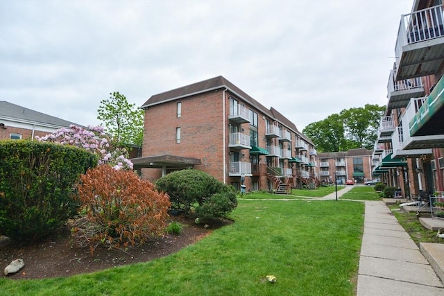 1186 Worcester Rd Unit 1221, Framingham, MA 01702 - view of property's community featuring a lawn