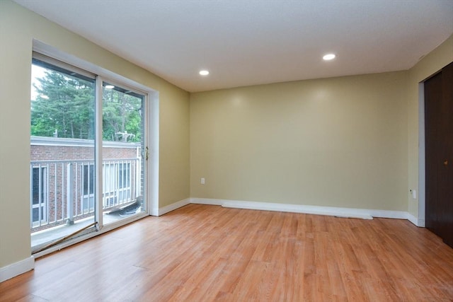 1186 Worcester Rd Unit 1221, Framingham, MA 01702 - empty room featuring light wood finished floors, baseboards, and recessed lighting