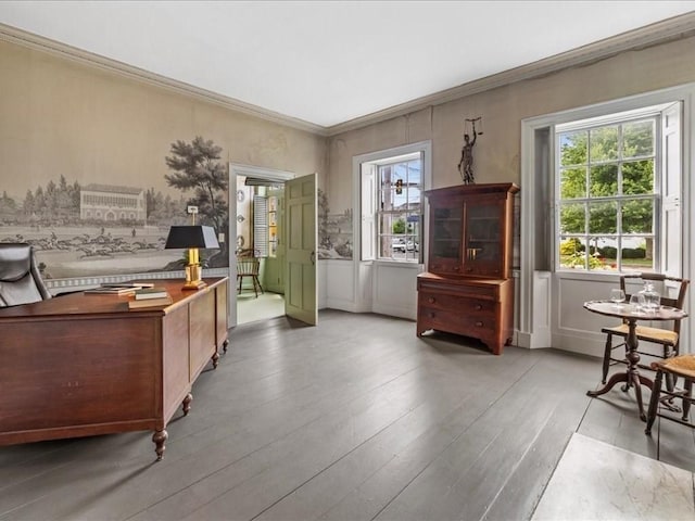 interior space featuring crown molding and light hardwood / wood-style flooring