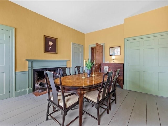 dining area with light hardwood / wood-style floors