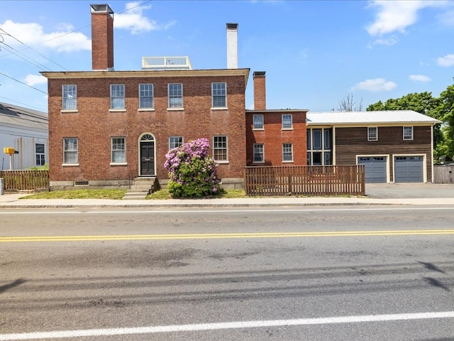 view of property featuring a garage