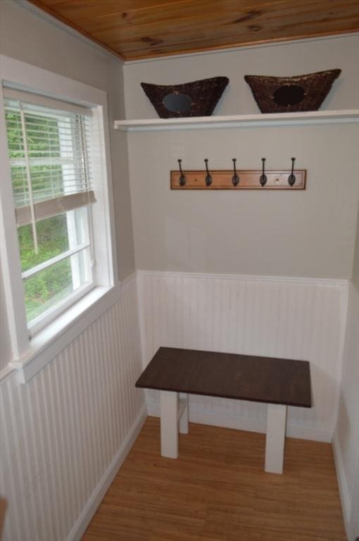 mudroom with wainscoting, wood finished floors, and wood ceiling