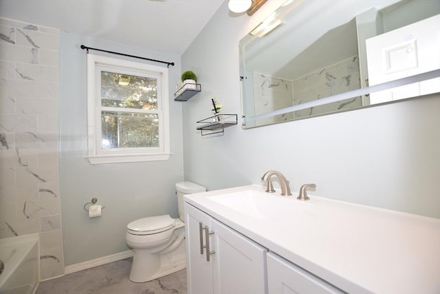 full bath featuring toilet, baseboards, vanity, and bathing tub / shower combination