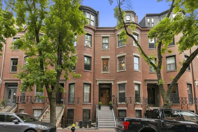 view of building exterior with stairs