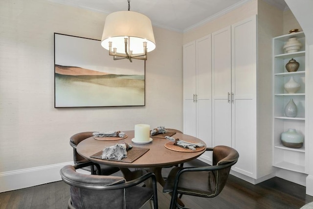 dining room with baseboards, dark wood finished floors, and an inviting chandelier