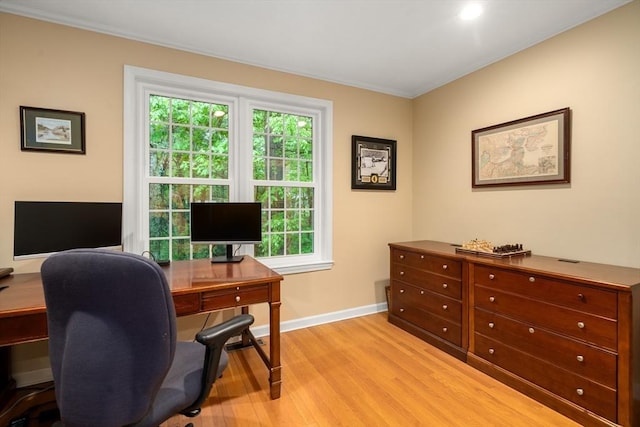 office with light wood-style flooring, baseboards, ornamental molding, and recessed lighting