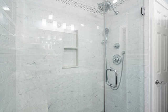 bathroom featuring a stall shower