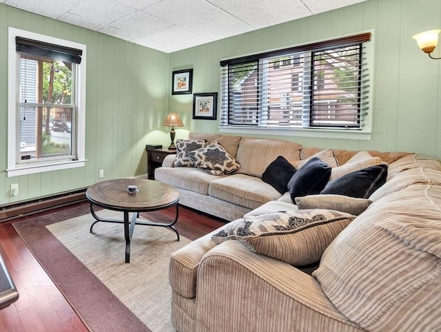 110 Reed St, Cambridge, MA 02140 - living area featuring wood finished floors and baseboard heating
