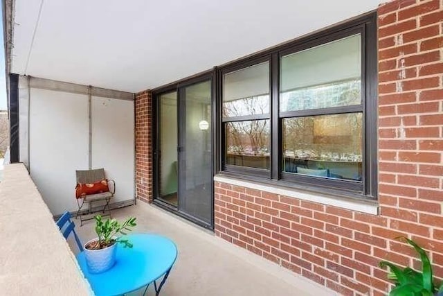 view of patio / terrace featuring a balcony