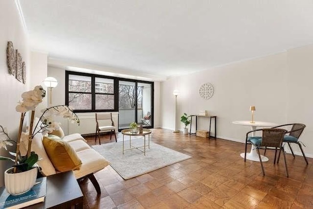 living room featuring baseboards