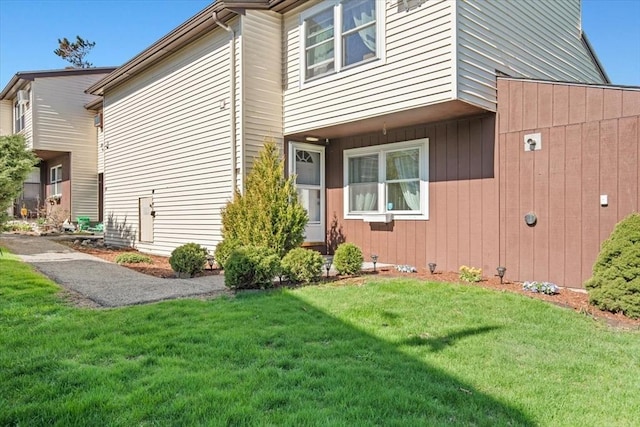 exterior space with a front lawn