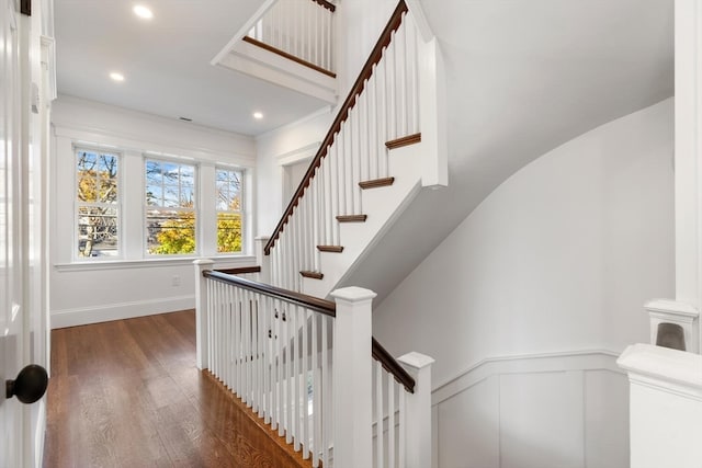 stairway with wood-type flooring